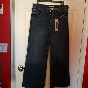 Wide cropped high-waisted distressed jeans 3/4